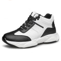 A black and white mid-top sneaker shown in a side profile on a white background, with a red circular graphic overlay in the top-left indicating a 6 cm height increase.