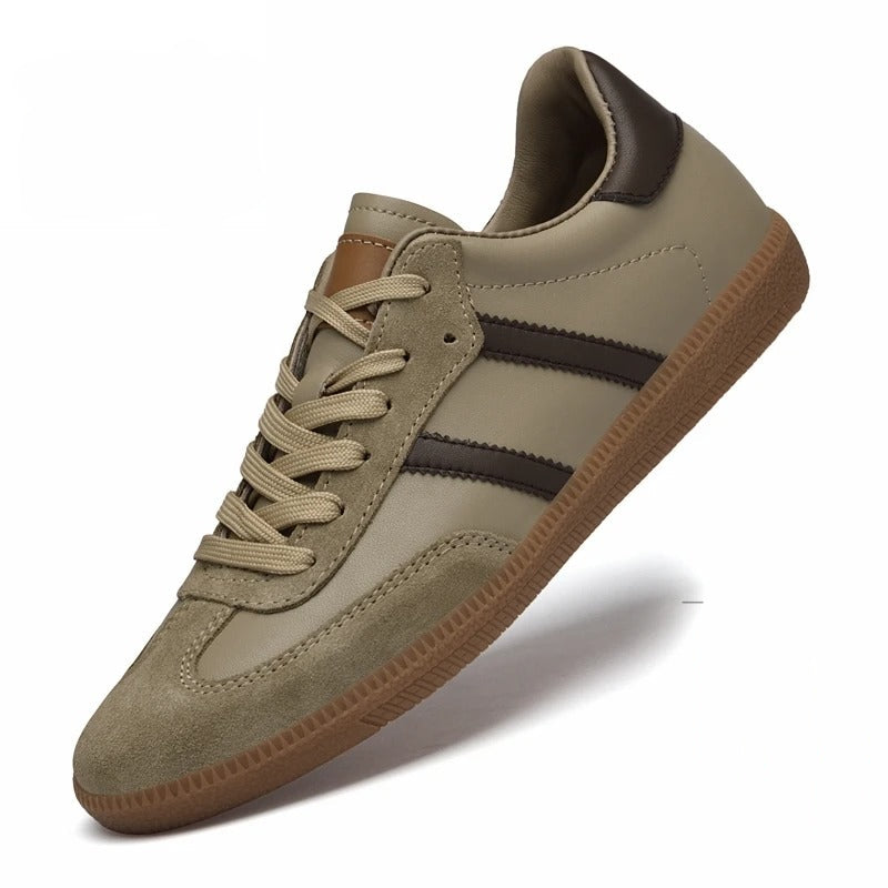 Beige sneaker with brown accents on a white background, featuring height-increasing text.